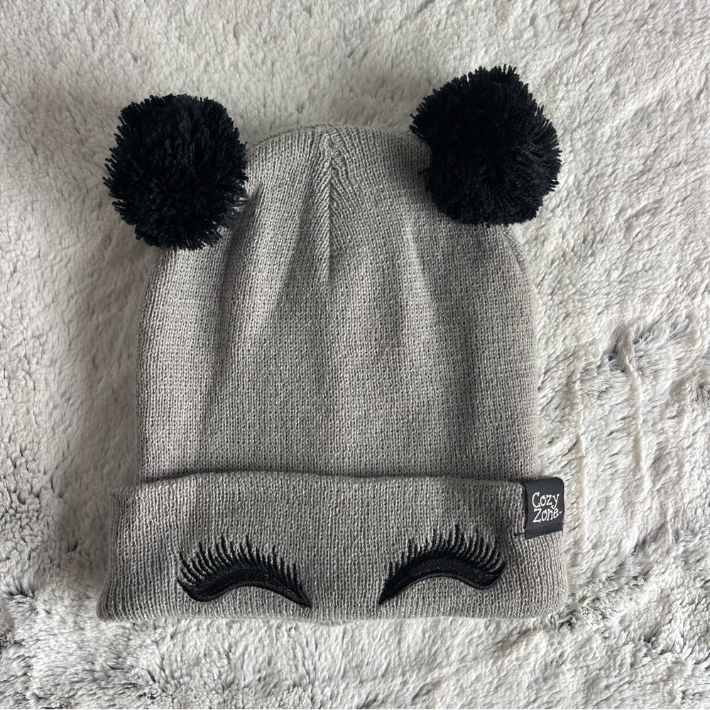 Cozy Zone Lash Pompom Beanie .